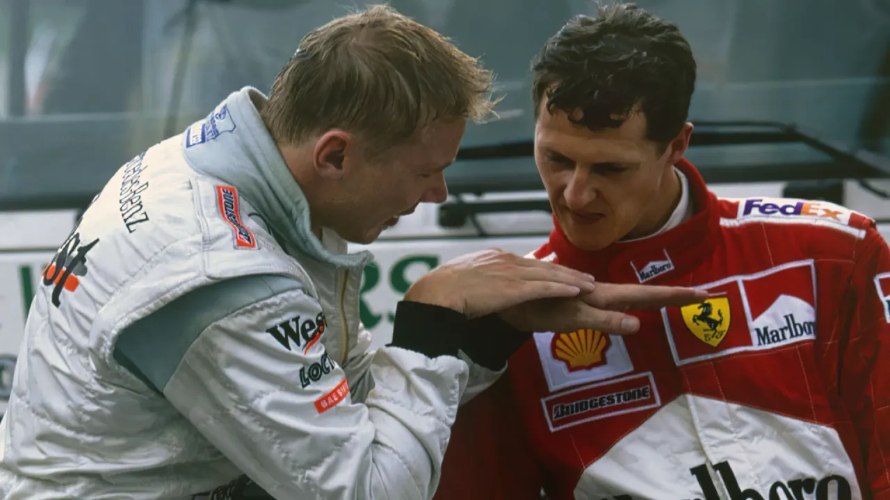 High-resolution version of my favorite picture of Häkkinen and Schumacher (Spa 2000) : r/formula1